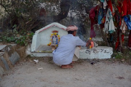 Priest doing puja in front of Bheru Shrine